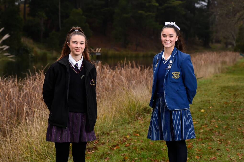 READY: Hannah Thorp from Phoenix P-12 Community College and Loreto College's Josie Oswin can't wait to get back to the classroom to complete their year 12 studies. Picture: Adam Trafford