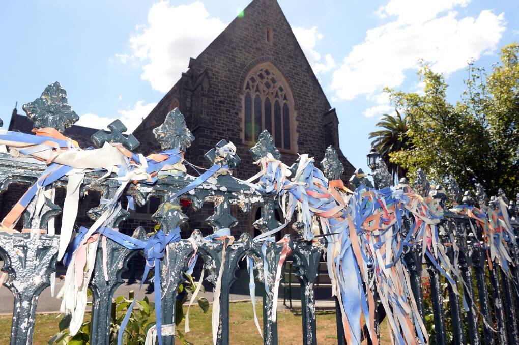 Ribbons on the fence of St Patrick's Cathedral will be removed to enable urgent maintenance works on the gothic-style cast-iron fence. Picture by Kate Healy
