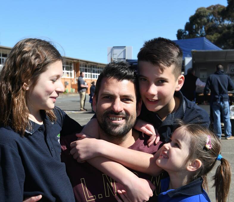 DAD'S DAY: Tim Carroll attended the Mount Clear Primary School Fathers Day event with his children Layla, 9, Arlie, 5, and Harry, 12. Picture: Lachlan Bence