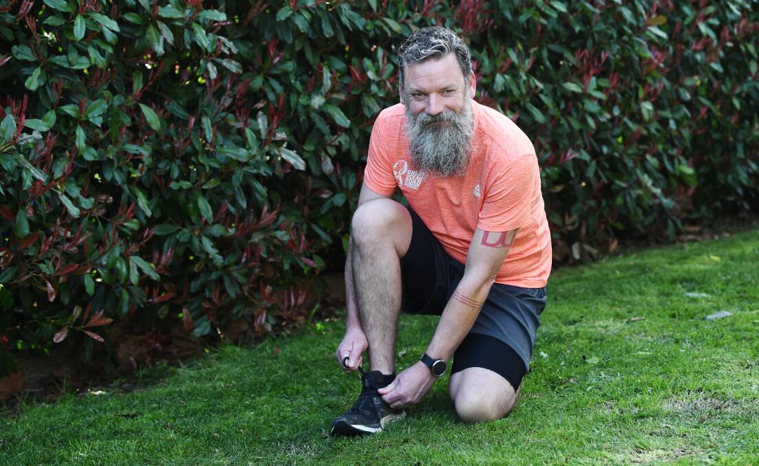 READY: Bob Carey-Grieve laces up for a training run ahead of his marathon from Ballarat to Ballan on Sunday to raise money for BRICC. Picture: Kate Healy 