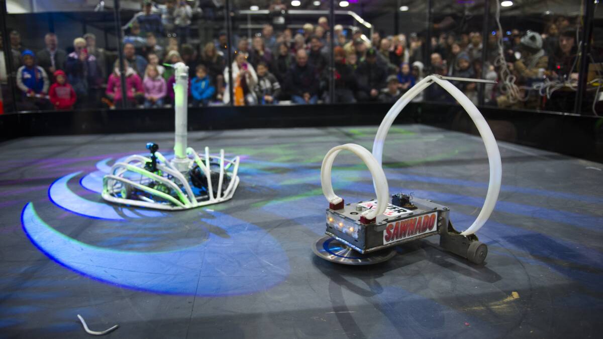 DUEL: Robots Overkill and Sawnado clash at the Robot Wars show at the Big Boys Toys Expo at Exhibition Park in Canberra in 2016.