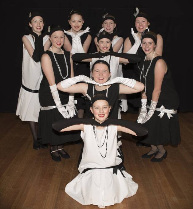 CHOOKAS: The year eight and nine Charleston Girls from Ballarat Grammar's senior school production Springtime on Broadway strike a monochrome pose in costume during rehearsals for next month's show. 