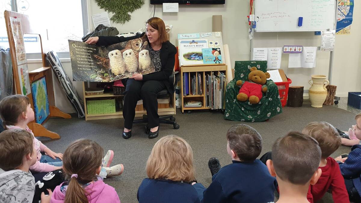 STORY TIME: Wendouree MP Juliana Addison reads a book to the kinder class at Wendouree Children's Centre, which will be expanded to include maternal and child health rooms.