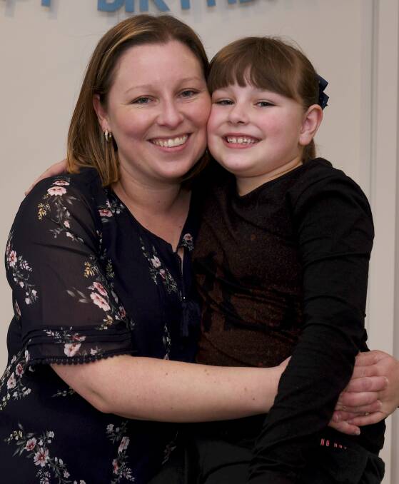 BOND: Hollie Fowler with her daughter Scarlett, 8. Picture: Lachlan Bence