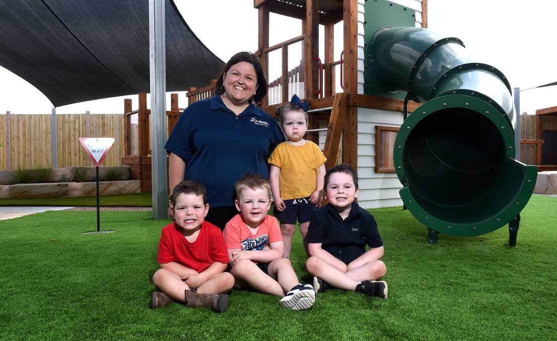 NEW BEGINNINGS: Journey Early Learning Delacombe director Beth Matheson with Billy, Huxley, Eloise and Carter.