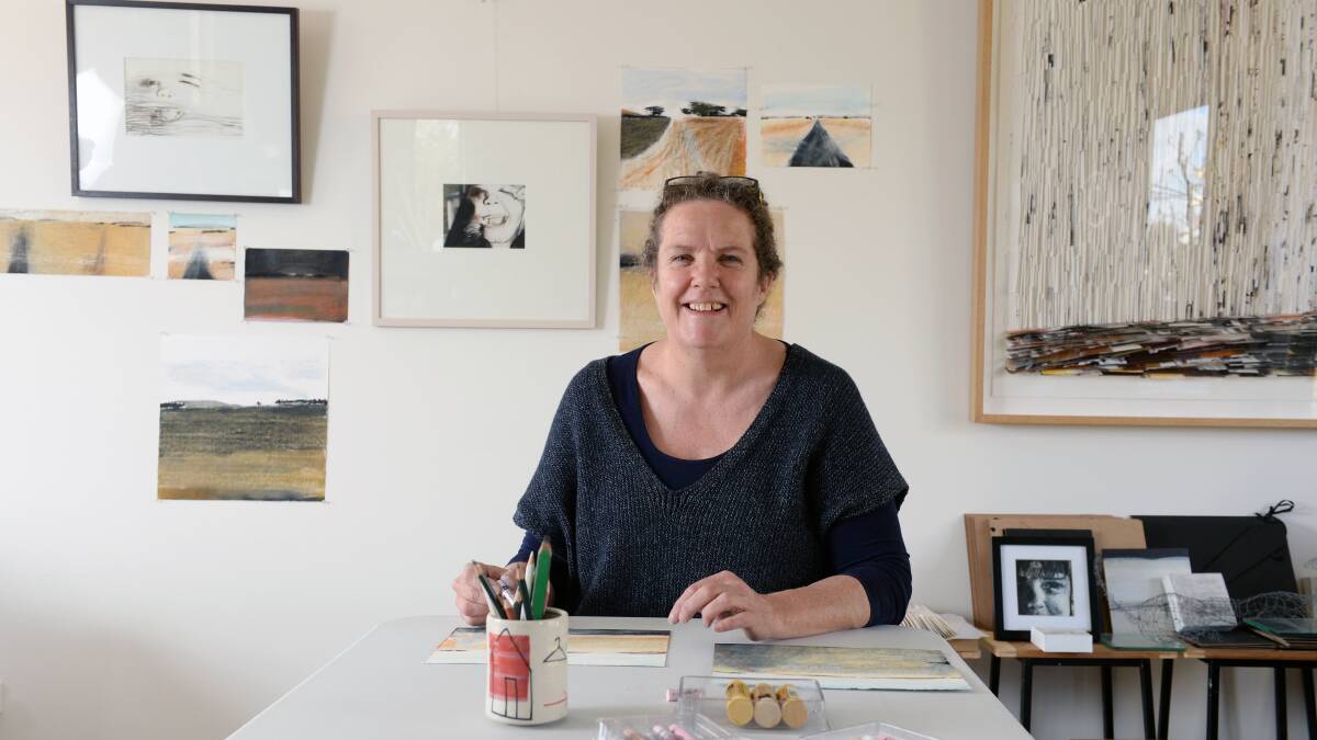 WORKING: Artist Tarli Glover creating with pastels in her Ballarat studio. Picture: Kate Healy