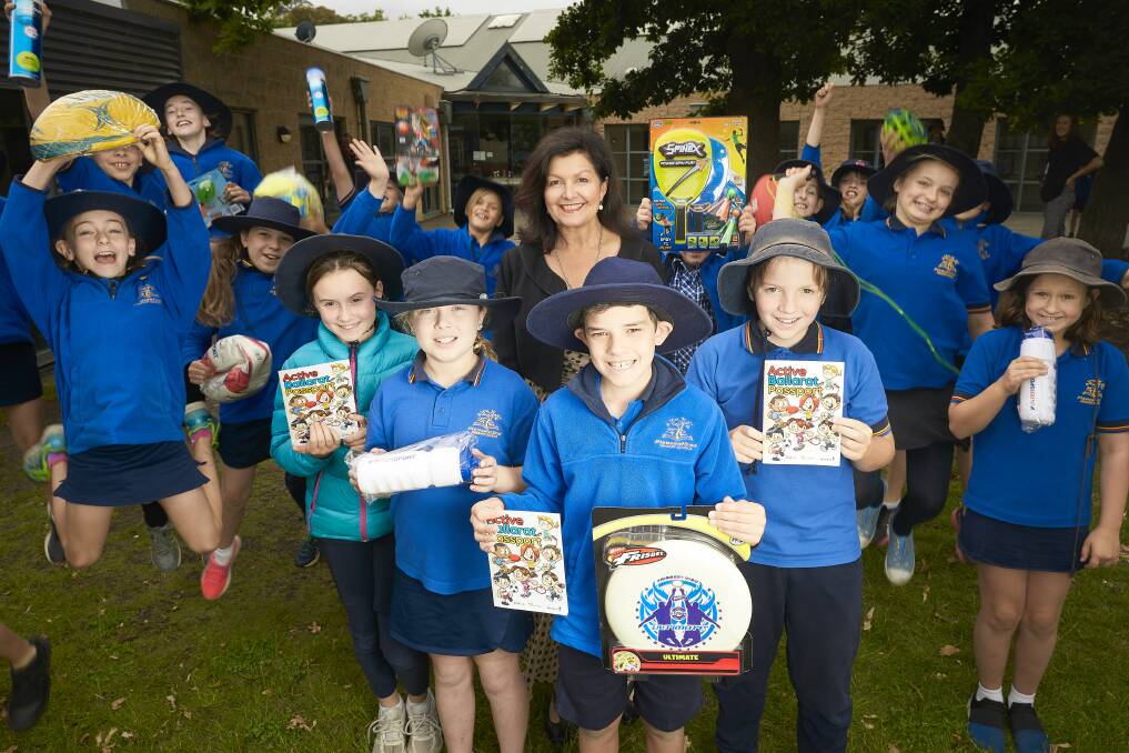 ACTIVE: Year three and four pupils from Pleasant Street Primary School told mayor Samantha McIntosh how they had become more active, spent less time on their iPads and were drinking more water after the successful City of Ballarat Active Ballarat Passport trial. Picture: Luka Kauzlaric