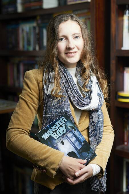 PUBLISHED: Ballarat author Ruth Fox celebrates receiving copies of her latest book Monster Boy, a fantasy tale with real-world inspiration for pre-teen readers. Picture: Luka Kauzlaric