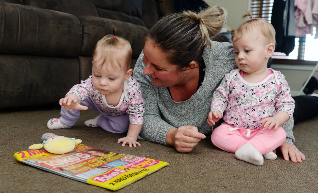 PLAYTIME: Emmie, left, and Alexa with mum Louise Heaysman. Picture: Kate Healy