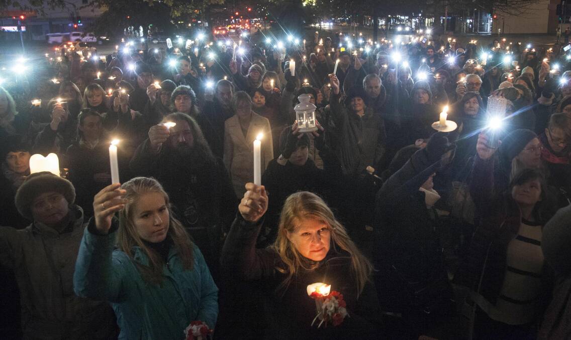 REFLECTION: Emotions ran high during a candle-lit march honouring Eurydice Dixon and other victims of violence as hundreds of Ballarat residents took part in one of 20 vigils held simultaneously across the country. Picture: Mark Smith