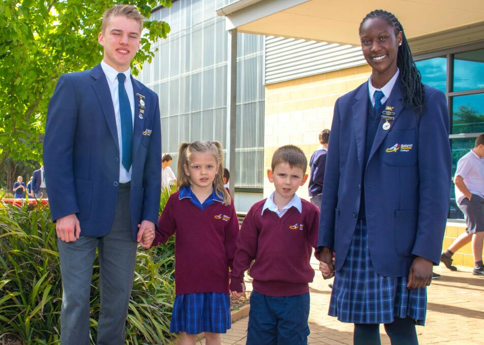 LAST DAY: Ballarat Christian College year 12 captains Tom and Nyaruot with their prep buddies Olivia and Isaac. Picture: Ruth Orr
