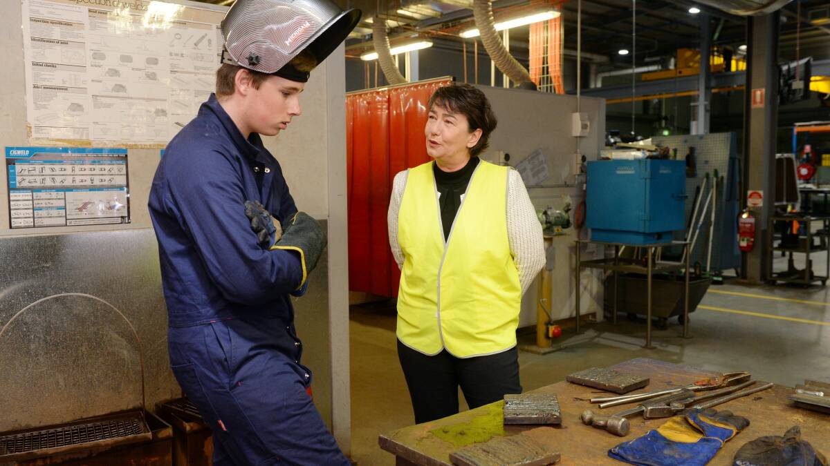 WELDED: Karl Block talks about his plans to become a welder with Buninyong MP Michaela Settle. Picture: Kate Healy