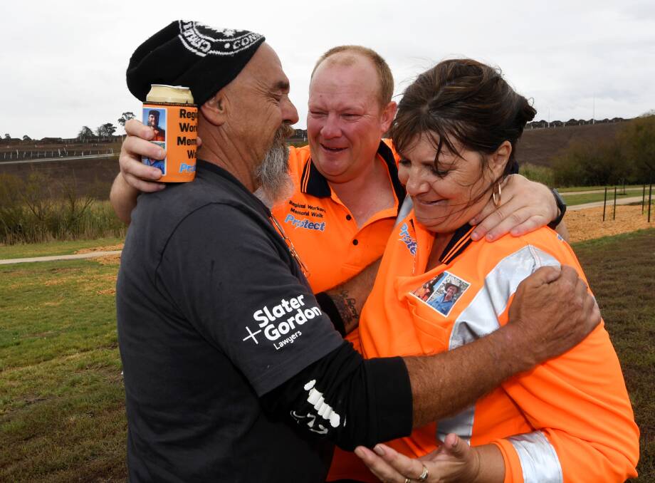 REMEMBERING: Dave and Janine Brownlee with Kelly Dubberley (centre) at the end of the walk, on the third anniversary of the deaths of Jack Brownlee and Charlie Howkins in a trench collapse. Picture: Lachlan Bence