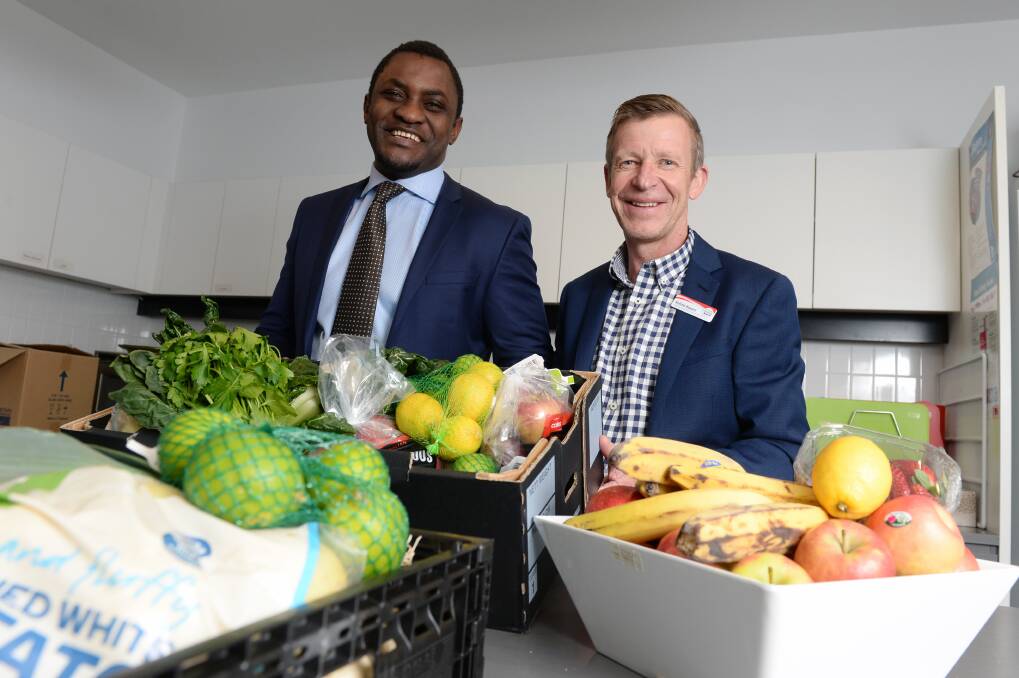 FOOD SECURITY: Simon Tengende and Andrew Howard discuss improving the availability of healthy food for disadvantaged Ballarat residents. Picture: Kate Healy