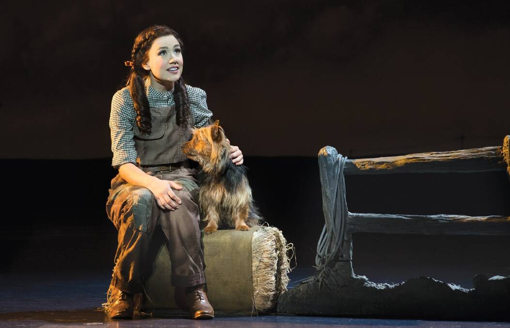 STRONG BOND: Dorothy (Samantha Dodemaide) and Toto (Trouble) on stage in the Wizard of Oz