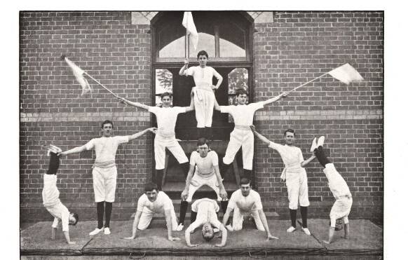 HISTORIC: St Patrick's College's 1905 gymnastic tableaux team show their physical prowess.