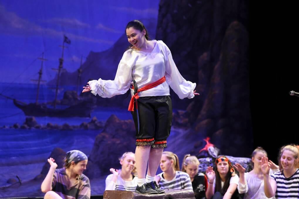 ON HIGH: Leyla Baysan belts out a Gilbert and Sullivan tune during final dress rehearsals for the Pirates of Penzance.