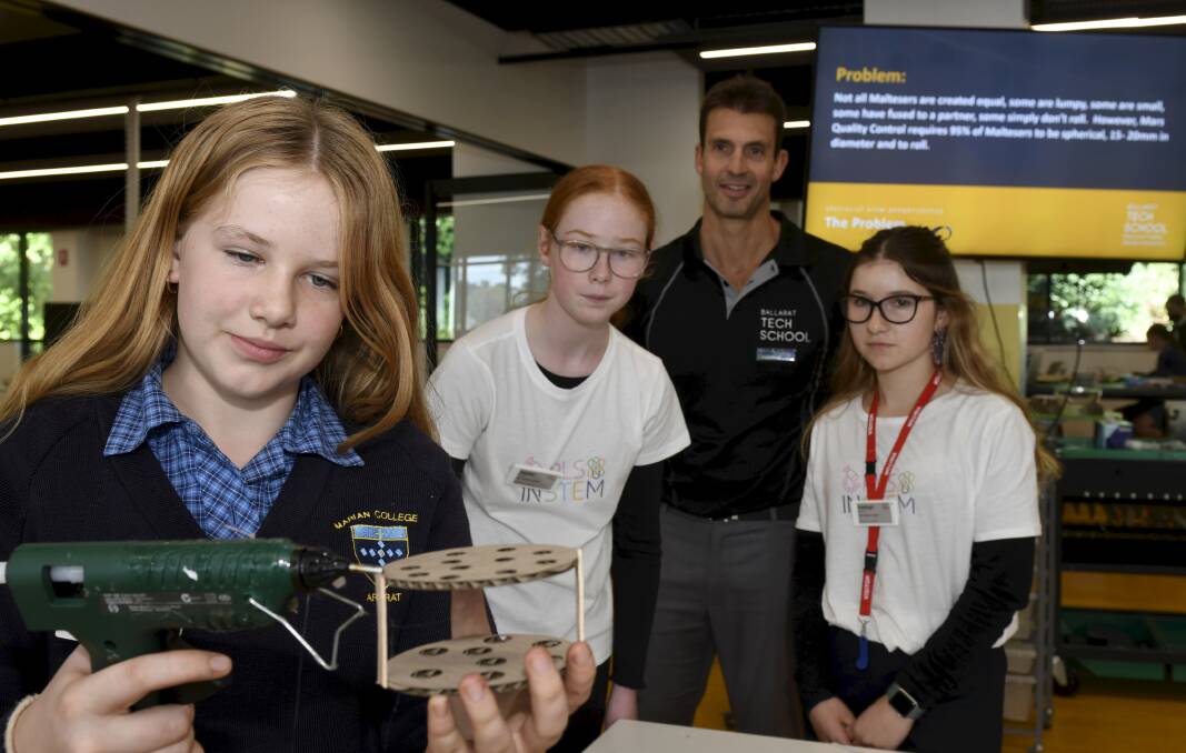 Girls in STEM participant Roxy with student leaders Hayley, Haileigh and Ballarat Tech School associate director Damon Minotti. Picture by Lachlan Bence
