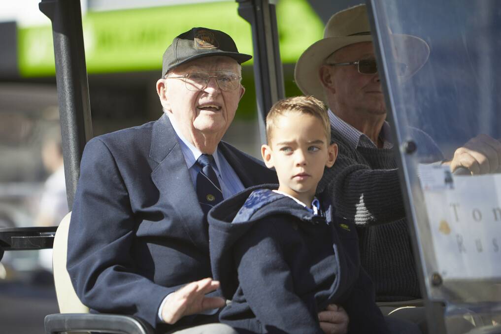 BUGGY: Tom Rush and his mate Oscar Kosloff share a ride in the 2018 Anzac Day parade. Picture: Luka Kauzlaric