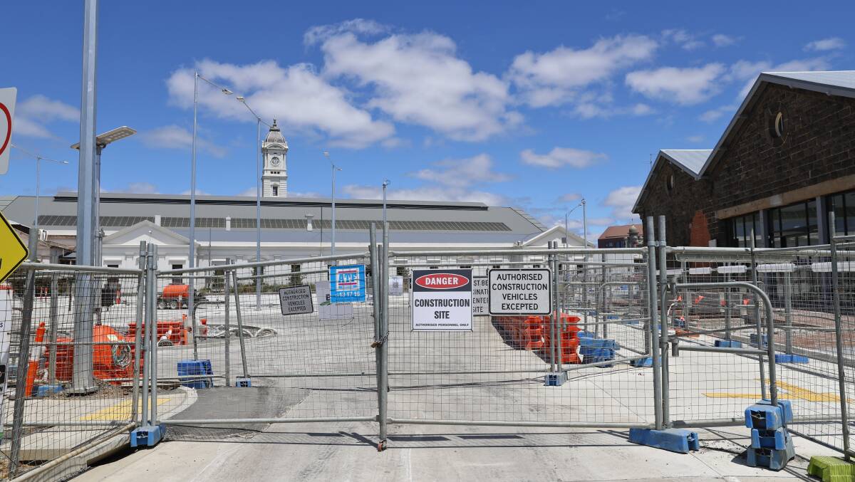FINAL PUSH: Works continue to finish the Ballarat bus interchange before its opening next month. Picture: Luke Hemer