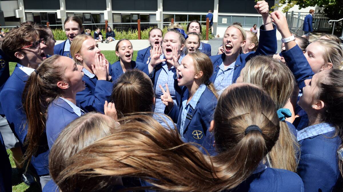 LOUD: The Damascus College spit crew practice the chants they hope will spur their rowers to victory in Sunday's Head of the Lake. Picture: Kate Healy 