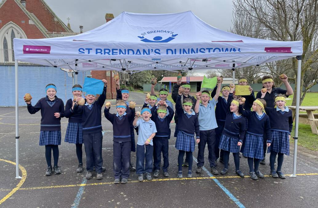 FUN: St Brendan's Dunnstown pupils get in to the Olympic spirit, holding their own Potato Olympics.