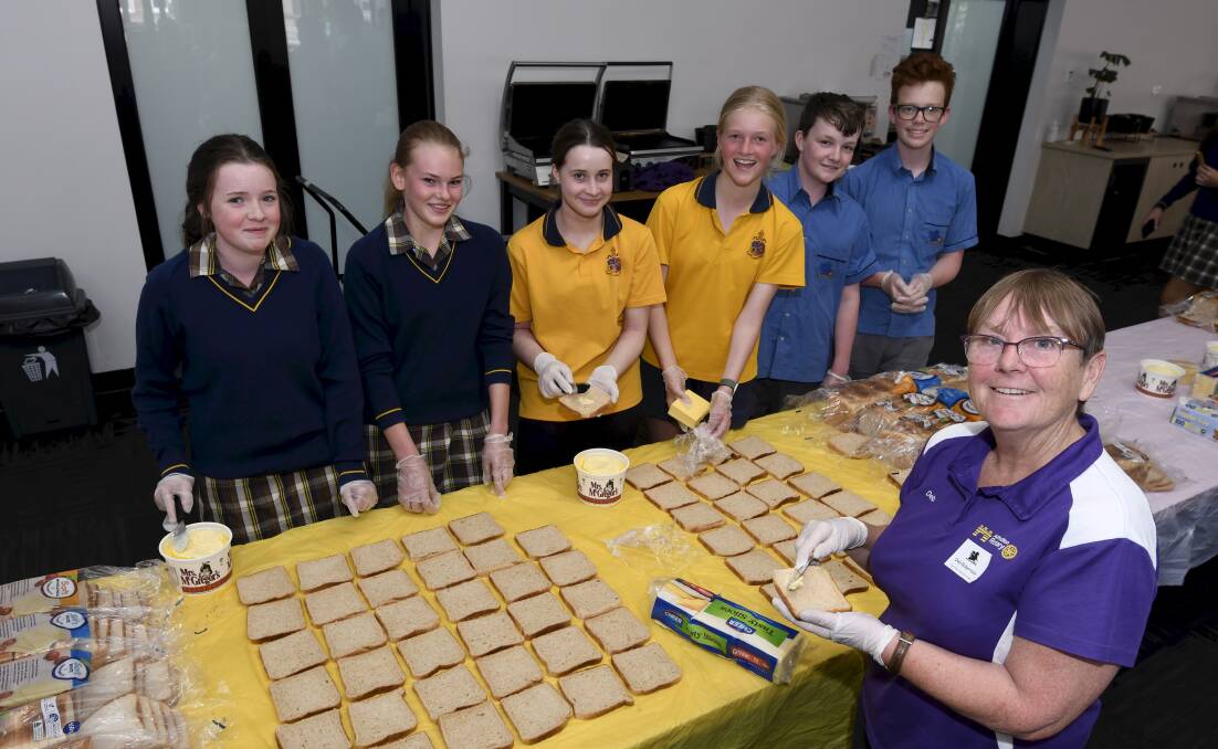 Ballarat Grammar students Lucy, Baylee, Alexis, Sadie, Max, and Tom with Alfredton Rotary member and Eatup Ballarat coordinator Deb Robertson. Picture by Lachlan Bence