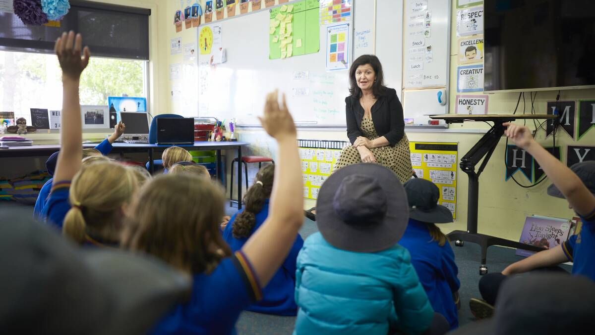 HANDS UP: Pleasant Street Primary pupils tell mayor Samantha McIntosh what they learned and their experiences in taking part in the Active Ballarat Passport trial. Picture: Luka Kauzlaric