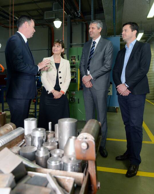 First: Industry and Employment Minister Wade Noonan with manufacturing officials Elizabeth Lewis-Gray, Stephen Macdonald and Rodney Walton. Picture: Kate Healy