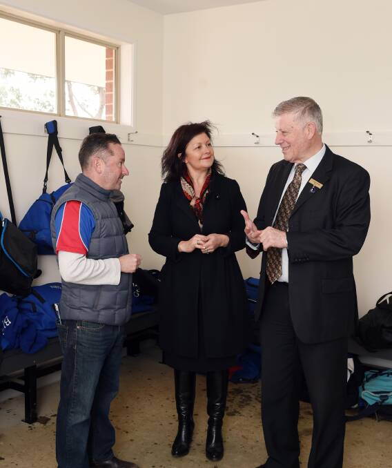 Impressive: East Ballarat Football Netball Club junior co-ordinator David Edwards admires Russell Square's new change rooms with councillor Samantha McIntosh and Mayor John Philips. Picture: Kate Healy