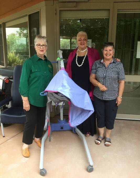 Can Assist president Bev Withers, Adina Care CEO Carol Heath, and home vice-president Jenny Apps outside the new palliative care room with some of the equipment.
