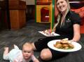 FUN FOR THE WHOLE FAMILY: Eight-month old Johanna and The Park Hotel co-owner Kate Lloyd prove lunch time can be fun when the whole family is involved. Picture: Lachlan Bence.