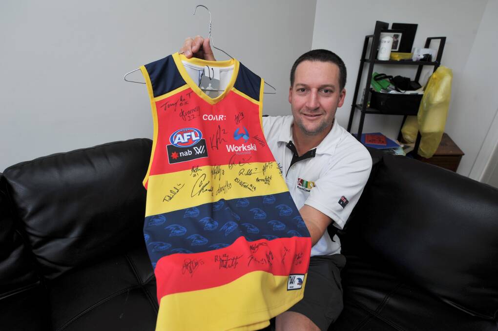 AUCTION: Former Mount Clear College student and AFLW Adelaide player Sally Riley has donated a signed jumper for Wednesday's fundraiser.