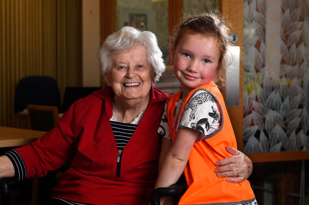 FRIENDSHIP: Midlands Kindergarten child Sophie has formed a bond with Hailey House resident Margaret. 