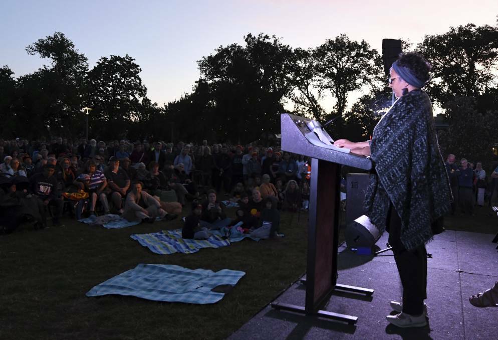 MOURNING: Maryanne Sam reads a list of Indigenous massacres at the Survival Day Dawn Ceremony. Picture: Lachlan Bence 