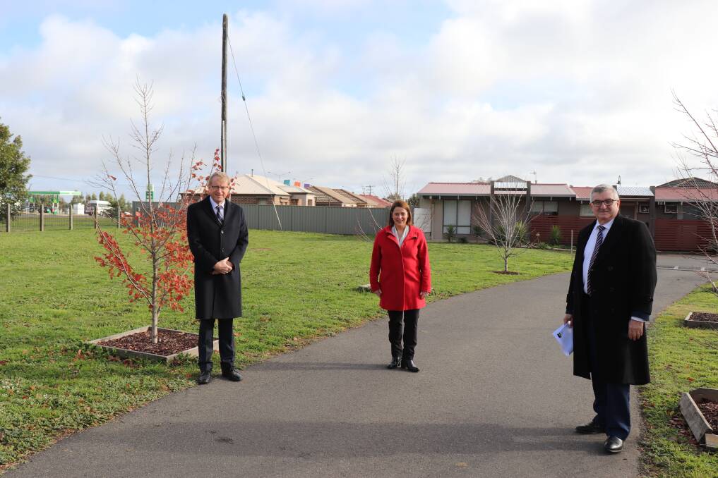 BOOST: Centacare Housing Board chair Neil Jens, Wendouree MP Juliana Addison and Centacare chief executive Tony Fitzgerald at the site where new social housing dwellings will be built. 