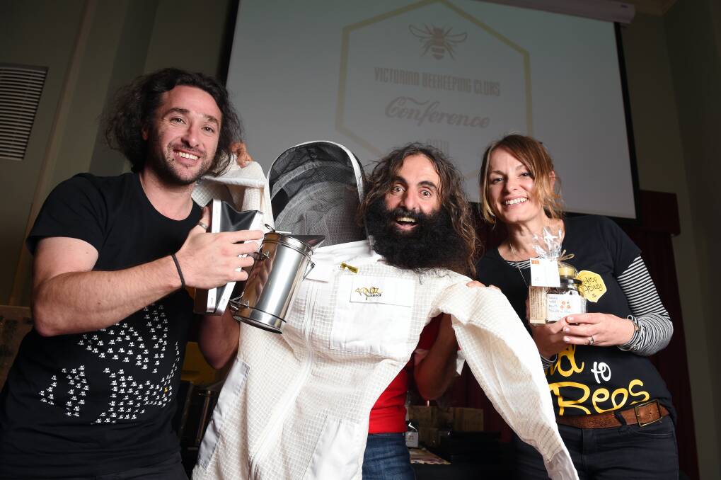 BUZZING TIME: Mat Lumalasi, Costa Georgiadis and Vanessa Kwiatkowski talk bees at the Victorian Beekeeping Clubs Conference in Ballarat. It's the first of its kind in the state, bringing bees back into the urban spotlight. Picture: Kate Healy