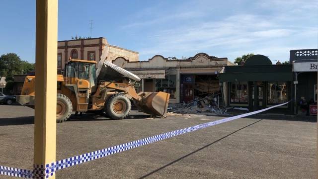 The stolen front-end loader was left running in the main street of Clunes after the robbery. 