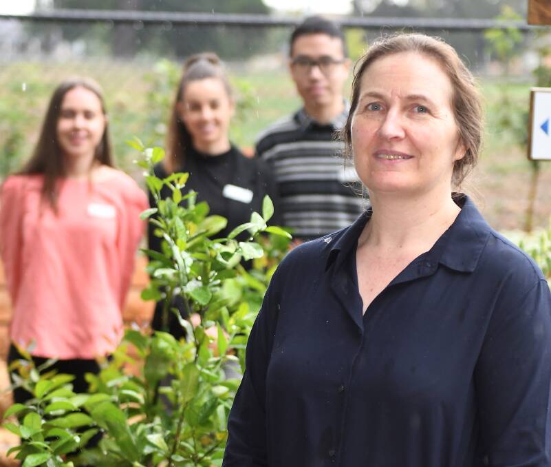 GOOD FOOD FOR ALL: Dietetics students Christine Nikolopoulos, Vanessa Morando and Jimmy Lee with City of Ballarat health and well-being planner Caroline Amirtharajah at the Food Is Free Green Space. Picture: Lachlan Bence 