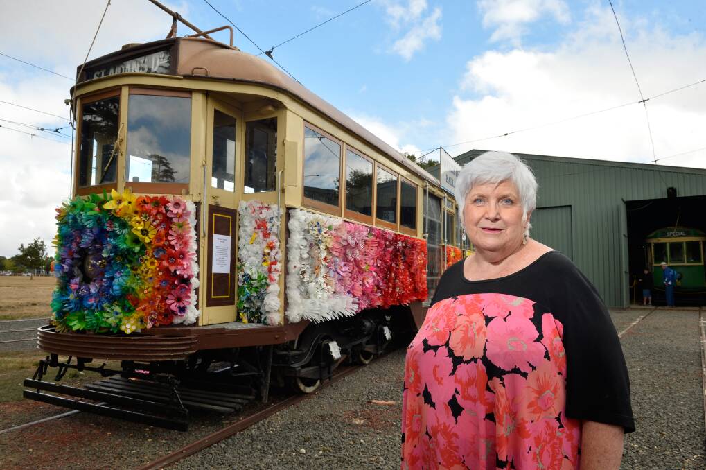 GROUNDED: Carolyn Priddle, who was involved in the Ballarat Tramway Museum Floral Tram project, was saddened to see the damage done to the tram from a car accident on Sunday. Pictures: Adam Trafford 