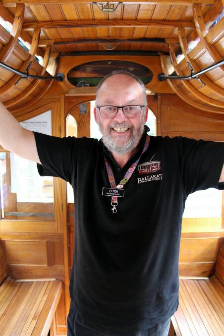 Ballarat Tramway Museum marketing manager Peter Waugh stands inside the original woodwork of the tram. He volunteered his time to help restore the tram over seven years. Picture: Rochelle Kirkham 