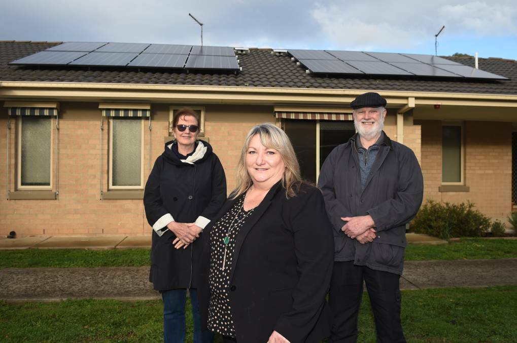 SAVINGS: BREAZE president Mary Debrett, McCallum executive manager accommodation services Noelene Collins and BREAZE board member Peter Reid in April at a site where solar was installed. Picture: Kate Healy 