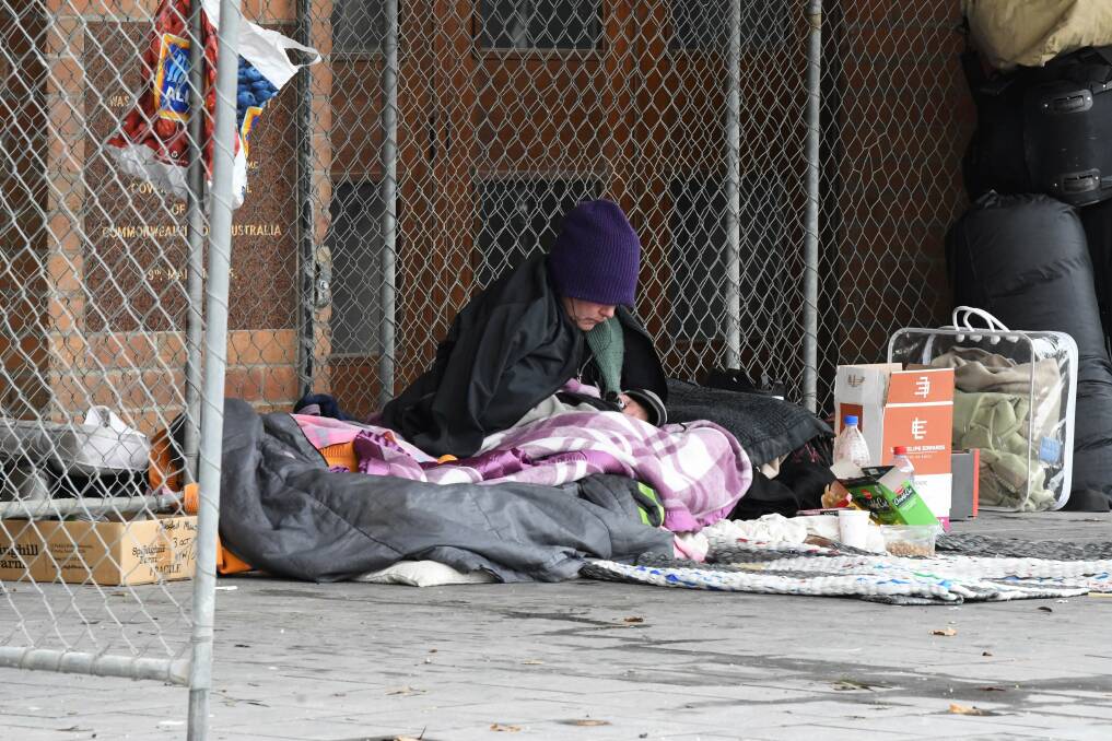 HOMELESS: A small group of people have set up 'home' outside Civic Hall, where they brave Ballarat's cold winter nights. It's not their first time battling the weather on Ballarat's streets, but don't know who else to turn to for help. Picture: Lachlan Bence 