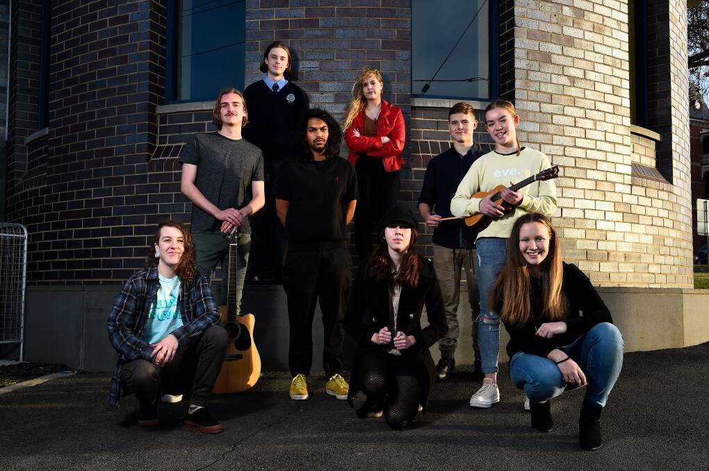 MUSIC GROWTH: Sonika youth leader Lucy Timms (bottom left) with some of the participants of the Sonika Records program. Picture: Adam Trafford 
