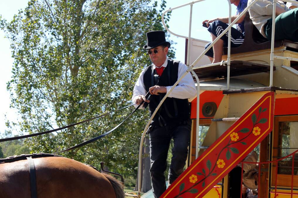 Sovereign Hill horse driver and trainer Tony Callaghan drives the tram by the lake. Picture: Rochelle Kirkham 
