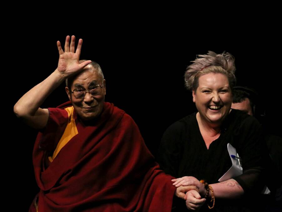 GUEST SPEAKER: Television and radio personality Meshel Laurie with the Dalai Lama in 2015. Ms Laurie describes herself as a very bad Buddhist, but she puts her heart and soul into improving every day. 