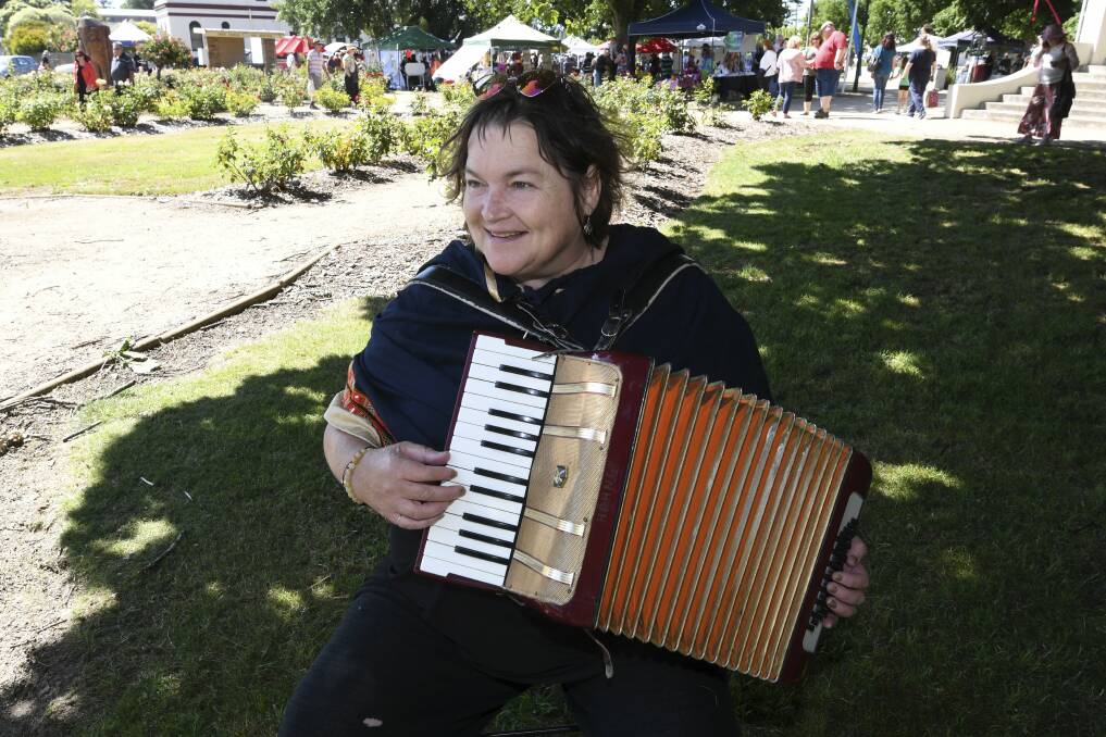Alicia Thomson played the accordion at the Beaufort Town Market to raise money for bushfire and wildlife relief.
