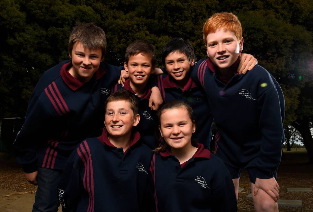 VOLUNTEERS: Mount Blowhard Primary School pupils Cameron, Gus, Leonard, Paddy, Bella and Jamie have been active volunteering for the community. Picture: Adam Trafford
