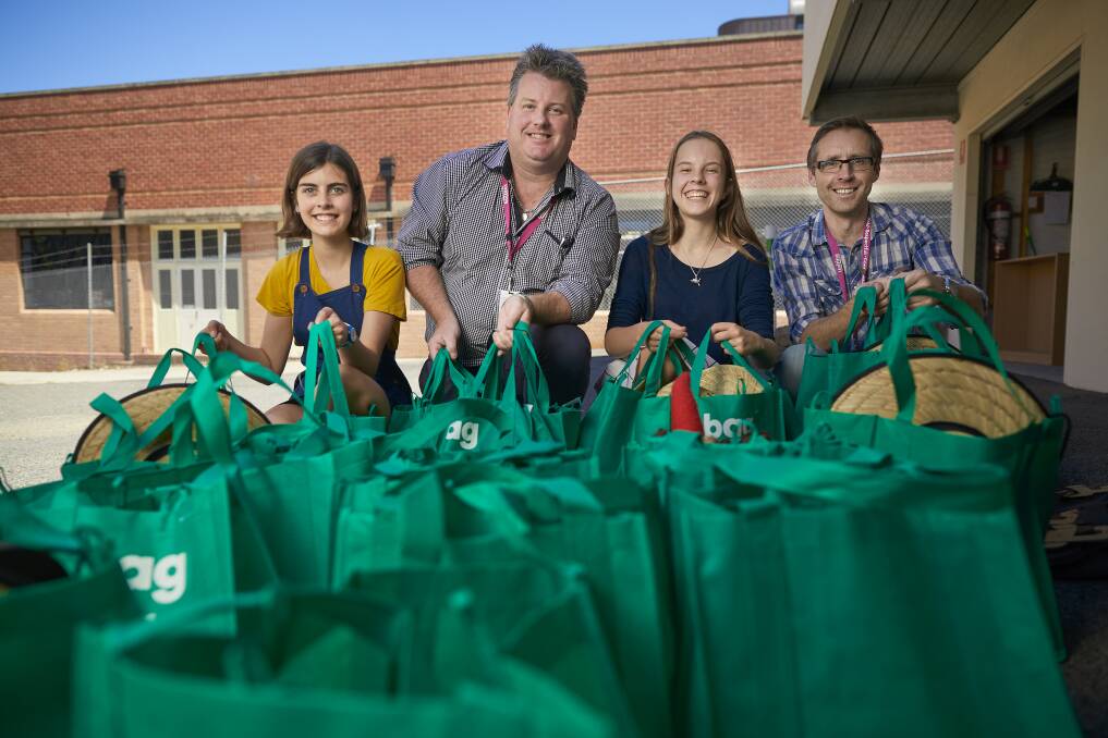 Ballarat youth councillor Kitty Wills, Street 2 Home Coordinator Adam Liversage, Ballarat youth councillor Bindi Phillips and assertive outreach worker James Treloar make extreme weather packs for people sleeping rough. Picture: Luka Kauzlaric
