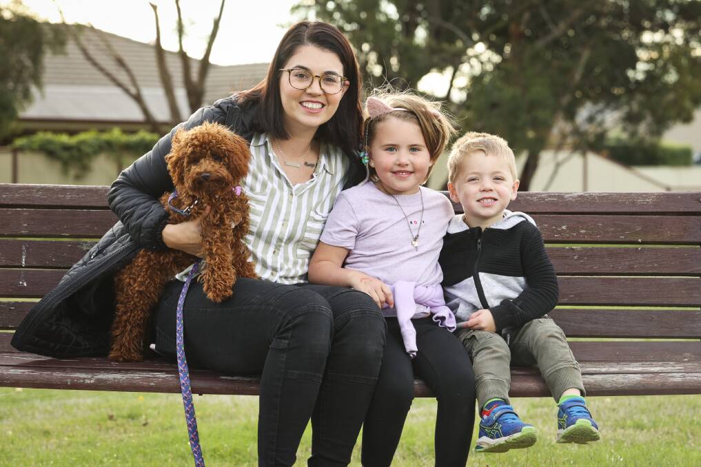 RESEARCH: Jess Rutherford with her children Ava and Levi and dog Stella. The family is raising funds and hosting an event in memory of baby Charlie who died in her sleep. Picture: Luke Hemer 